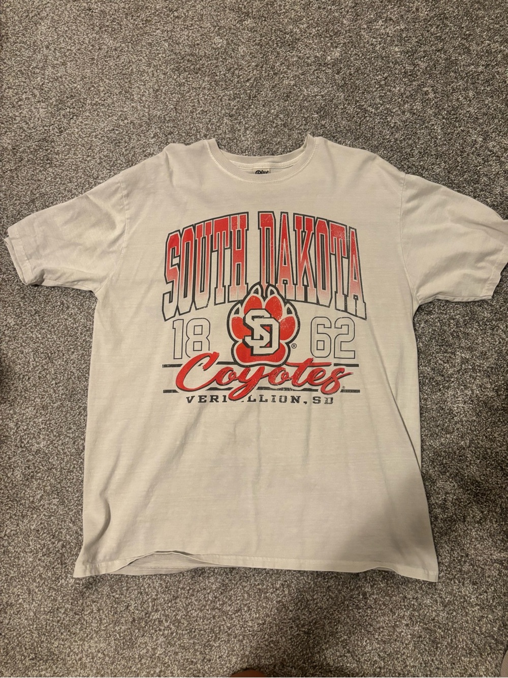 Blue 84 South Dakota Coyotes White Tee with Red Accent